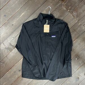 Patagonia Black Houdini Stash 1/2 Zip Jacket Lightweight. Size M. NWT